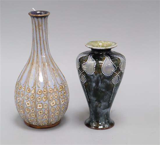 A Doulton Lambeth bottle vase by Harry Simeon, no. 396 and a Royal Doulton Art Nouveau vase by Frank A Butler, no. 588 (2)